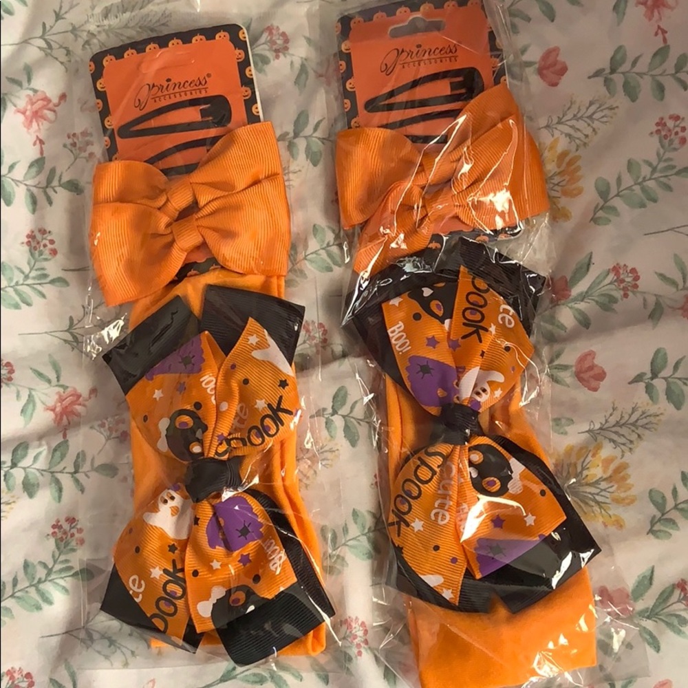 Hair clips and bows and a Halloween headband